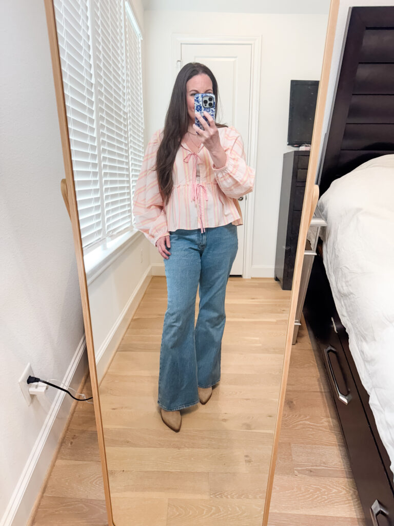 spring outfit | pink striped bow front top | flared jeans | Over 40 Fashion Blog Lady in Violet