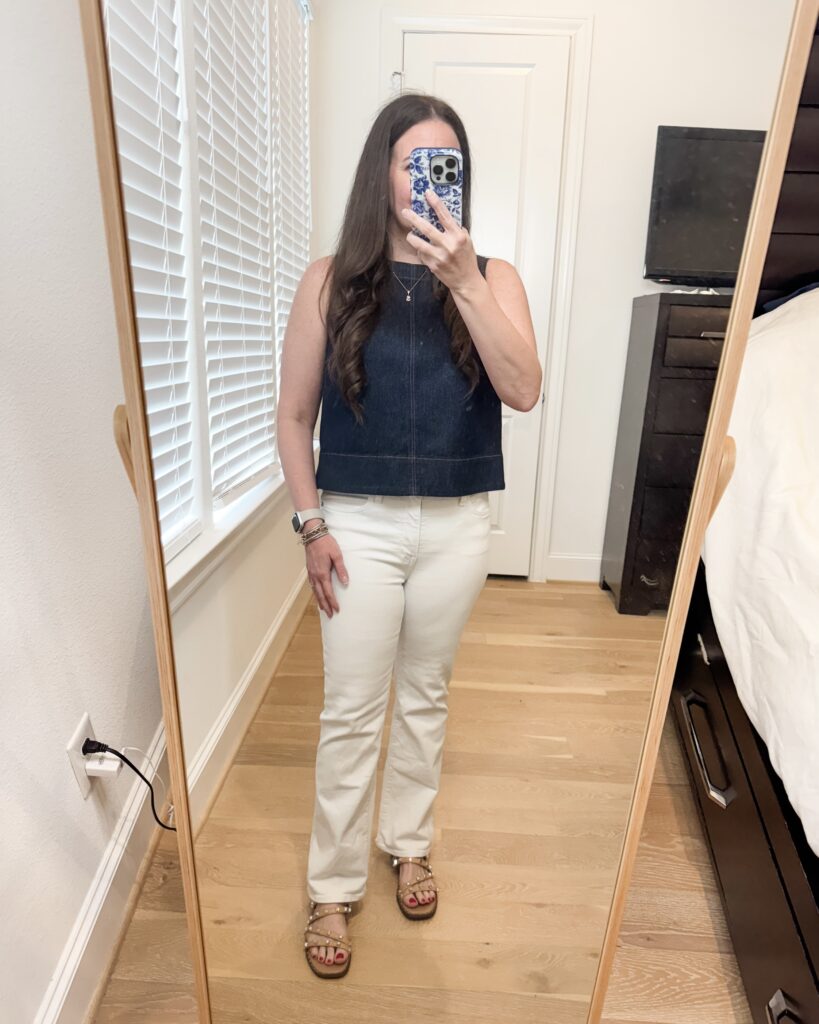 spring outfit idea | dark denim sleeveless top | white straight leg jeans | Over 40 Fashion Influencer Lady in Violet